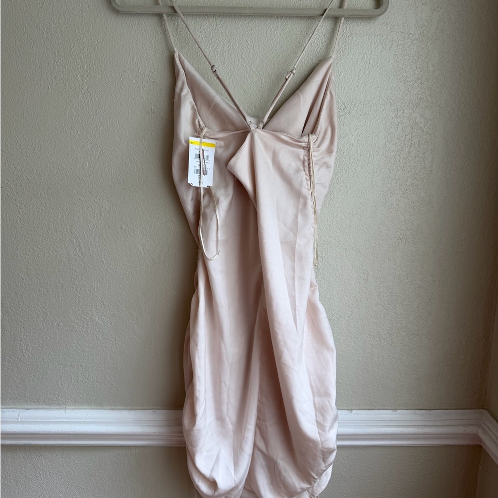Claire Mini Dress in Cream
ASTR the Label
Size large - Picture 4 of 7